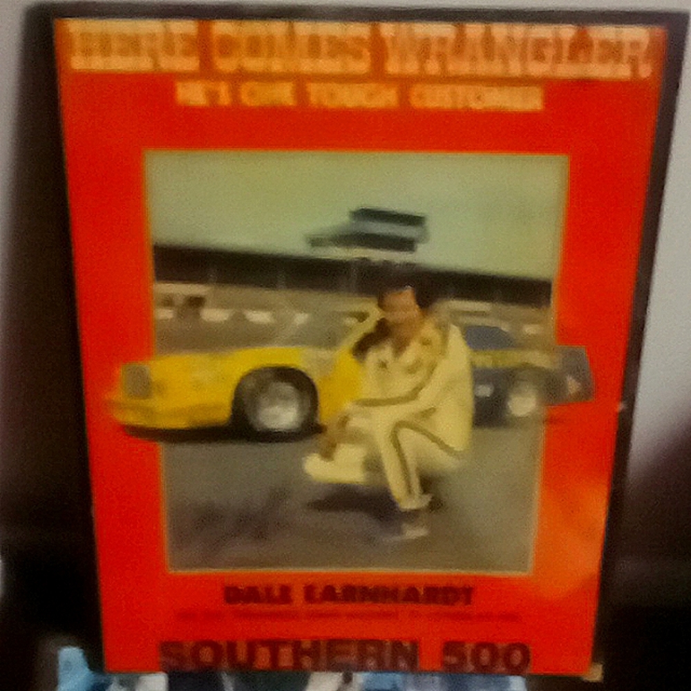 Racing plake, ever first wrangler car.